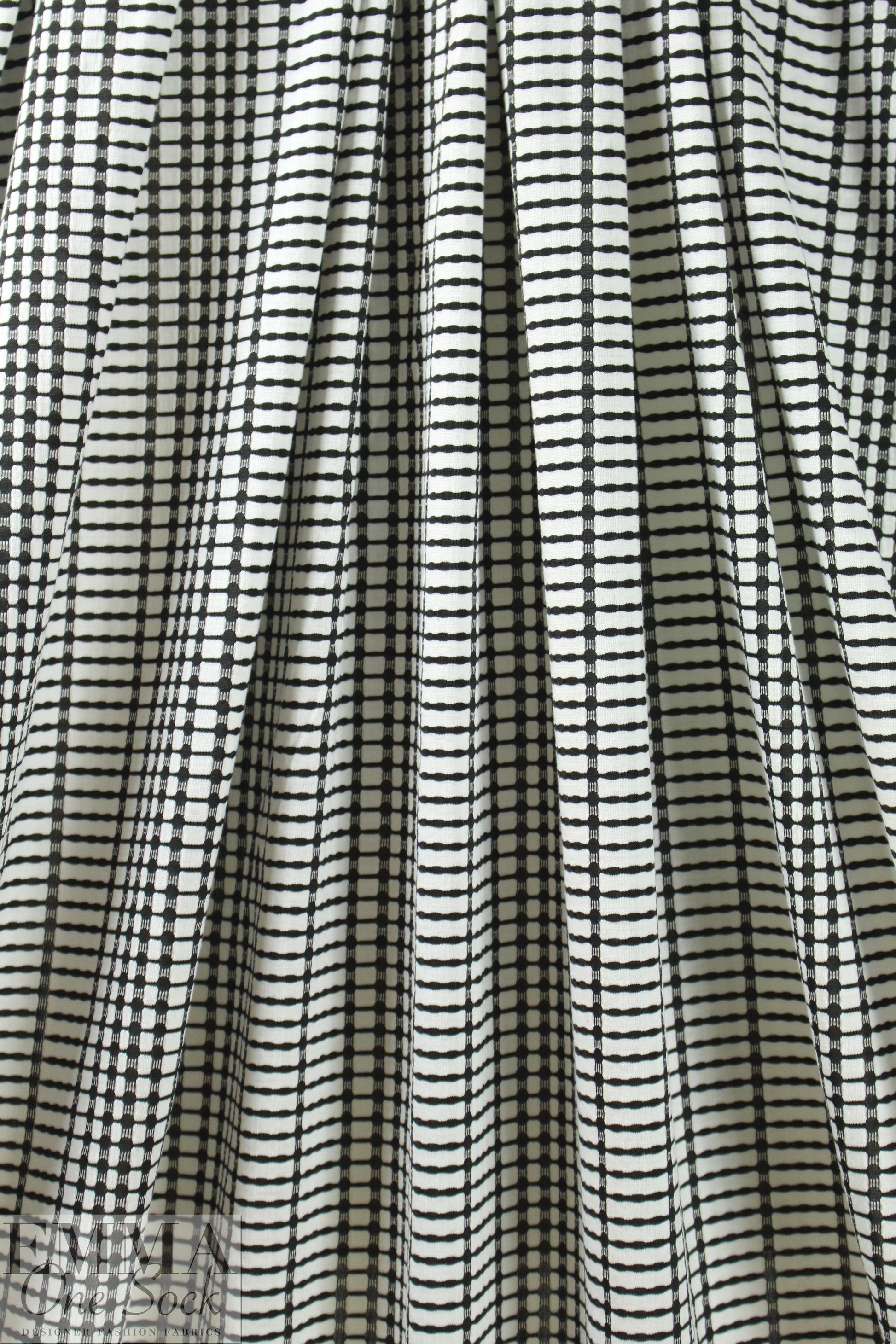 CA designer black/white yarn-dye grid novelty knit