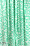 French mint/cream argyle graphic viscose/spandex knit