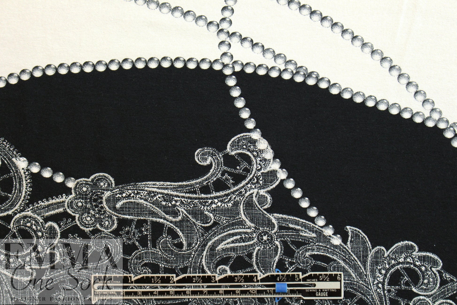 French pearls and lace viscose/spandex knit .625 yds