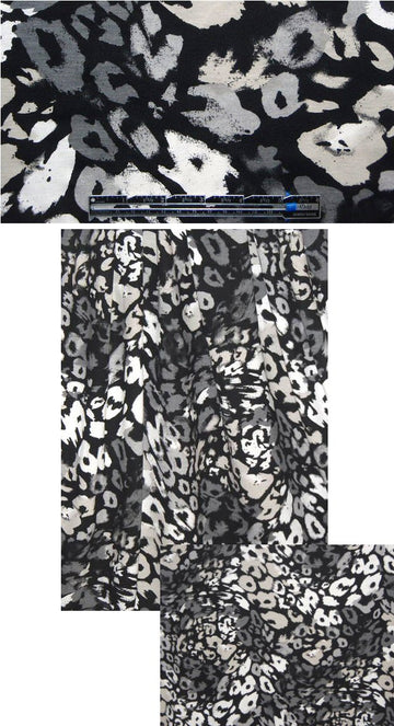 French stylized cheetah, black/gray tones knit 1.25 yds