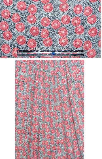 French red pinwheel flowers rayon/lycra knit 2.125 yds