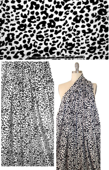 CA designer black/white cheetah rayon/lycra knit 1.25 yd