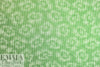 NY designer viscose knit - hidden flower pixel graphic .75 yds
