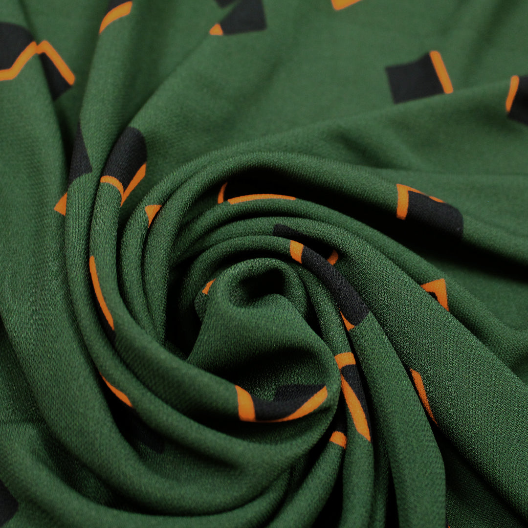 French geometric graphic viscose matte jersey knit - pine/orange 1 yard