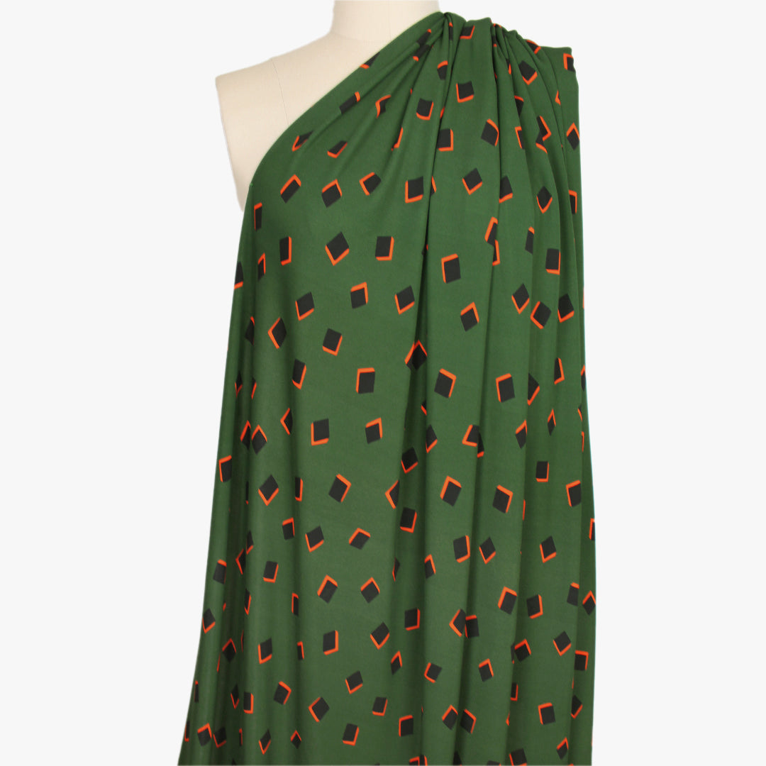 French geometric graphic viscose matte jersey knit - pine/orange 1 yard
