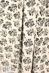 Rache1 Comey black floral on alabaster matte jersey knit .5 yds