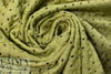 Italian textured dot 2-ply knit - avocado/black .625 yds