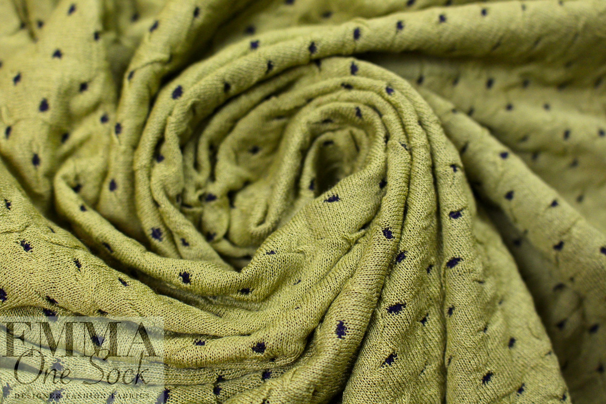 Italian textured dot 2-ply knit - avocado/black .625 yds