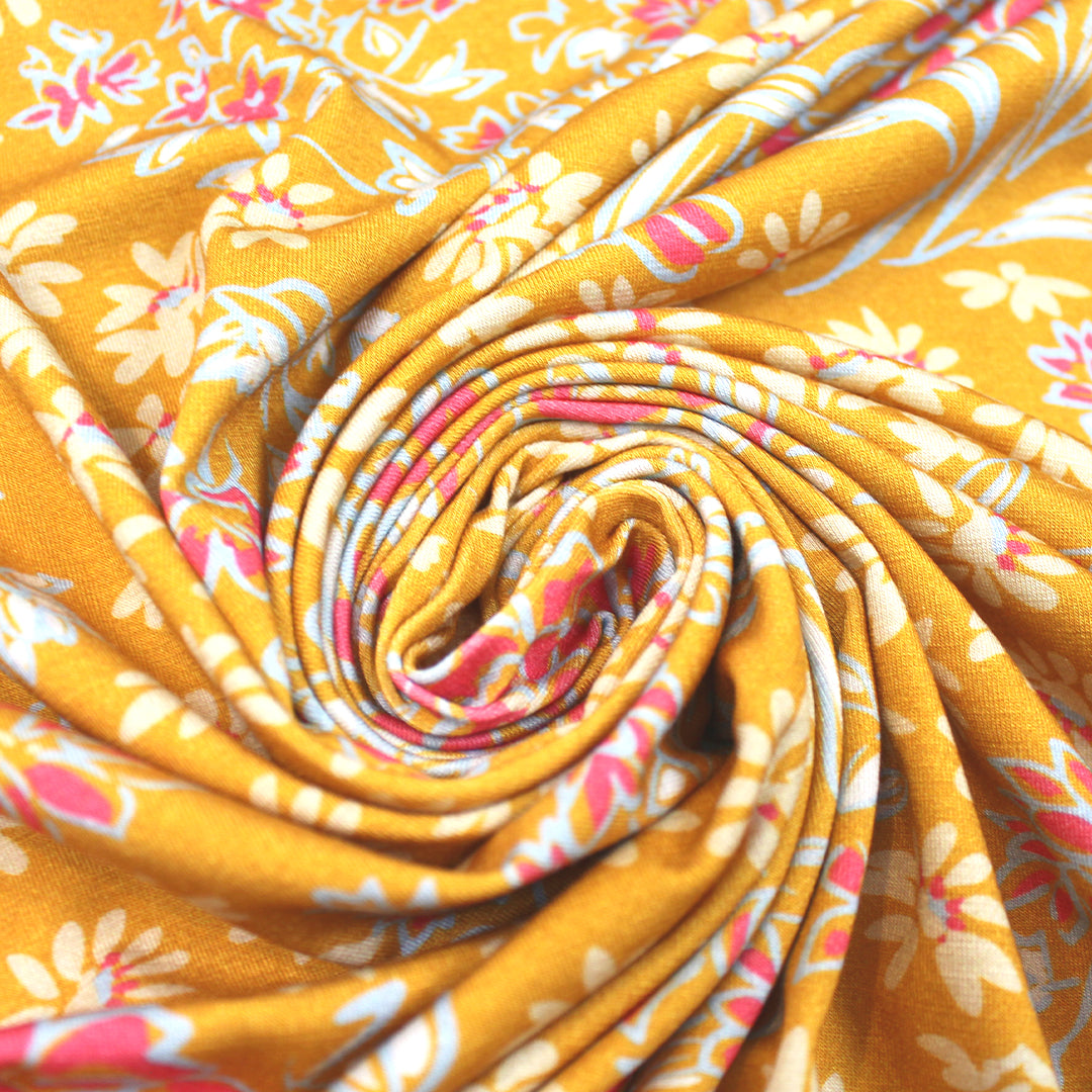 CA designer 'butterscotch blooms' printed rayon/spandex knit 1.5 yd
