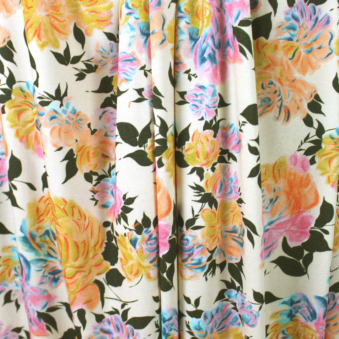 CA designer 'apricot blooms' printed rayon/spandex knit .875 yds
