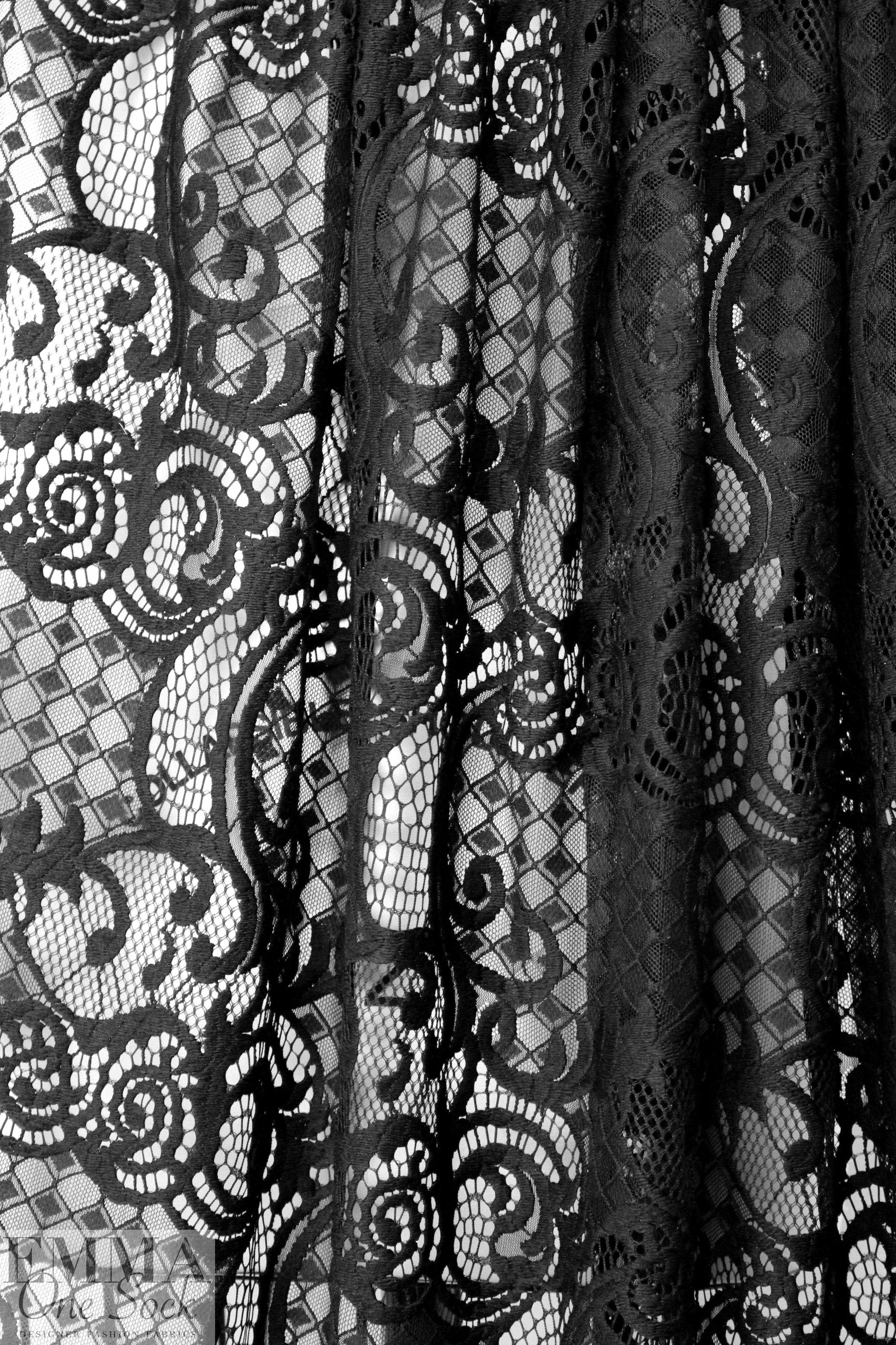 CA designer black lyrical graphic mesh lace 1.625 yds
