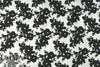 famous designer black 3-D floral applique' tulle lace