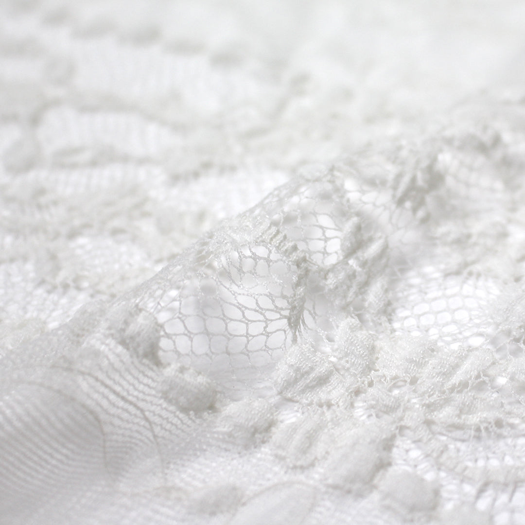 CA designer ivory floral woven mesh stretch lace .875 yds