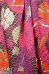 Trin@ Turk floral printed 'laser cut' poly knit 1.375 yd