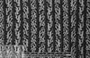 NY designer black faux leather strips on lace
