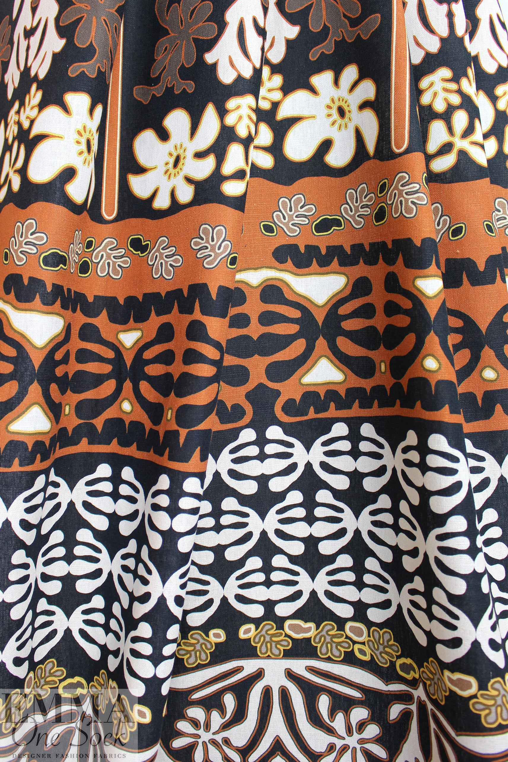 Italian Ankara-inspired linen woven - adobe/umber/licorice 1.125 yds