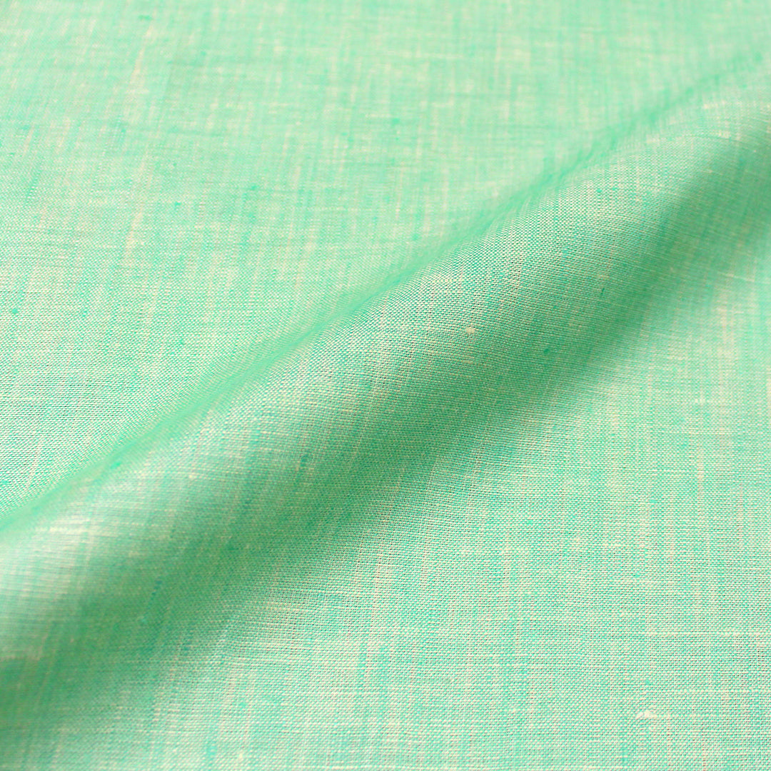 imported fine quality cross dye linen - minty green .625 yds