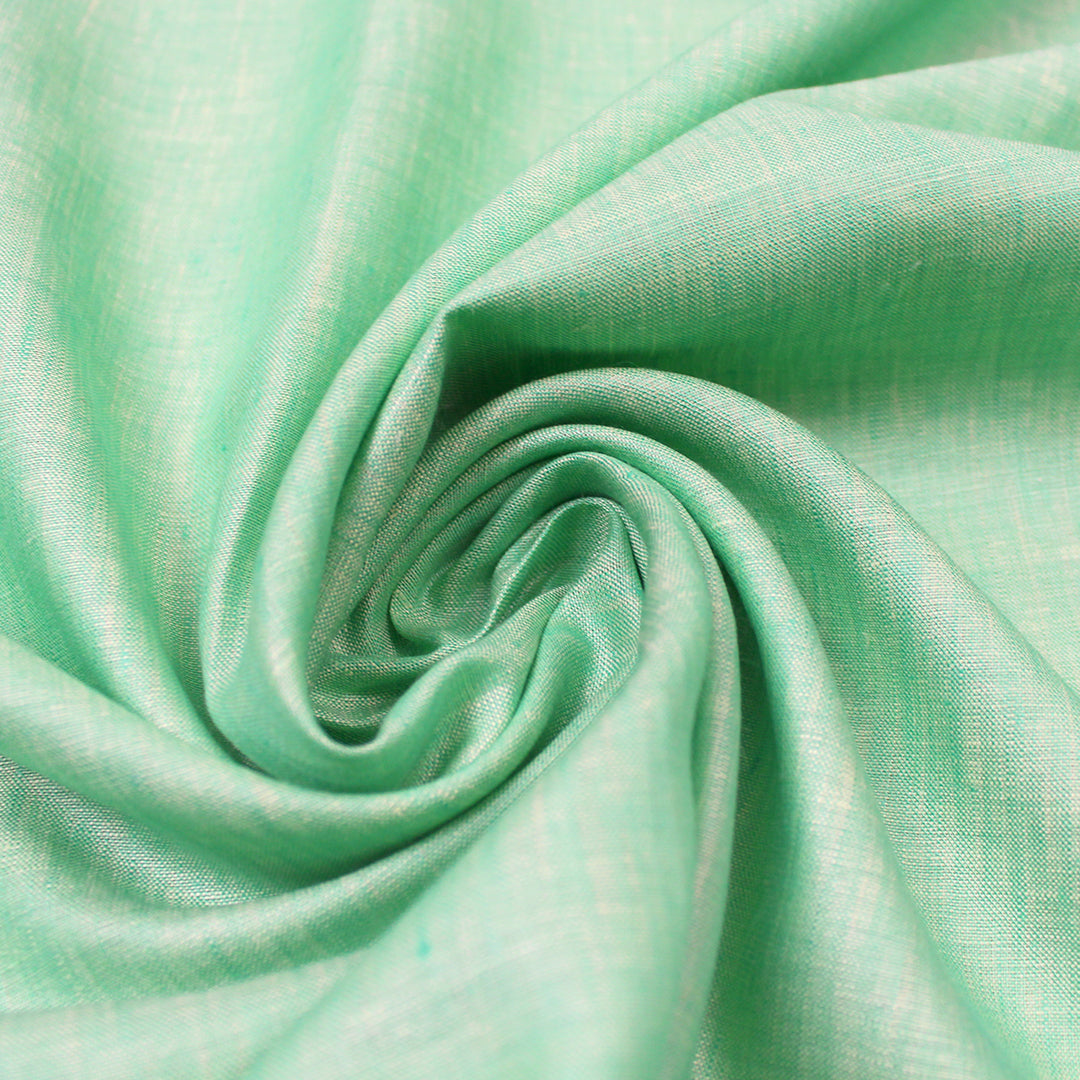 imported fine quality cross dye linen - minty green .625 yds