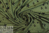 NY designer loden/black star print linen knit .5 yds