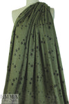 NY designer loden/black star print linen knit