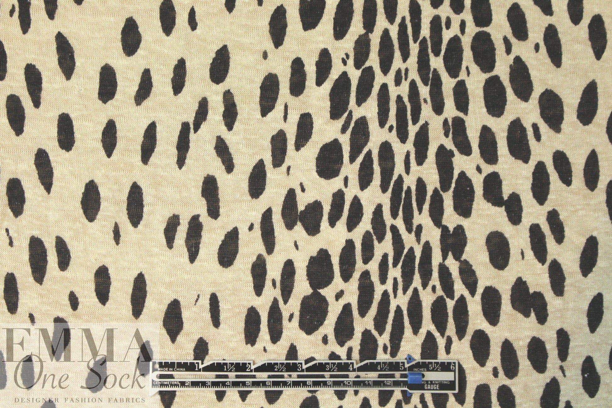 NY designer lightweight linen knit - animal dot .75 yds