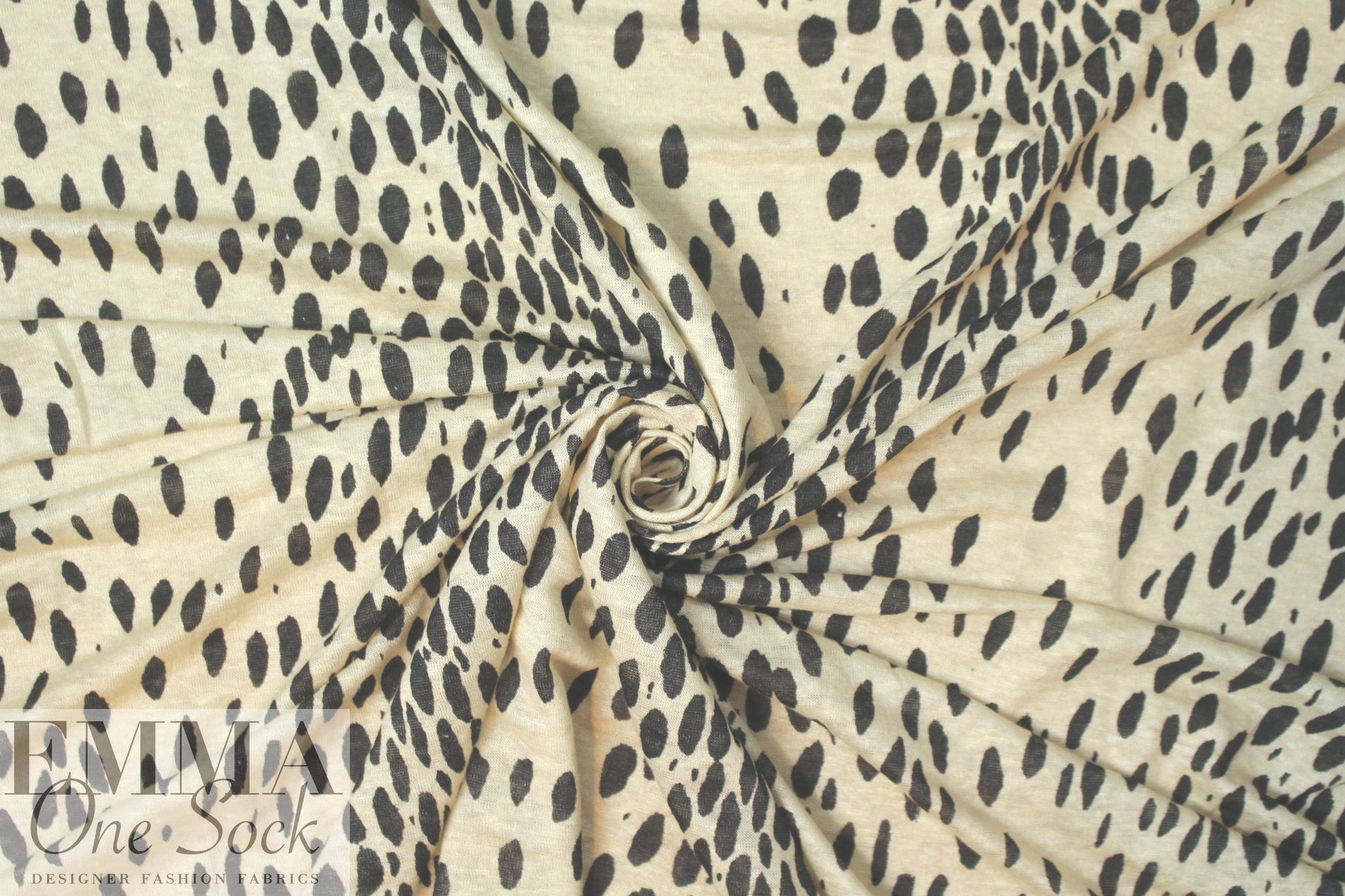 NY designer lightweight linen knit - animal dot .75 yds