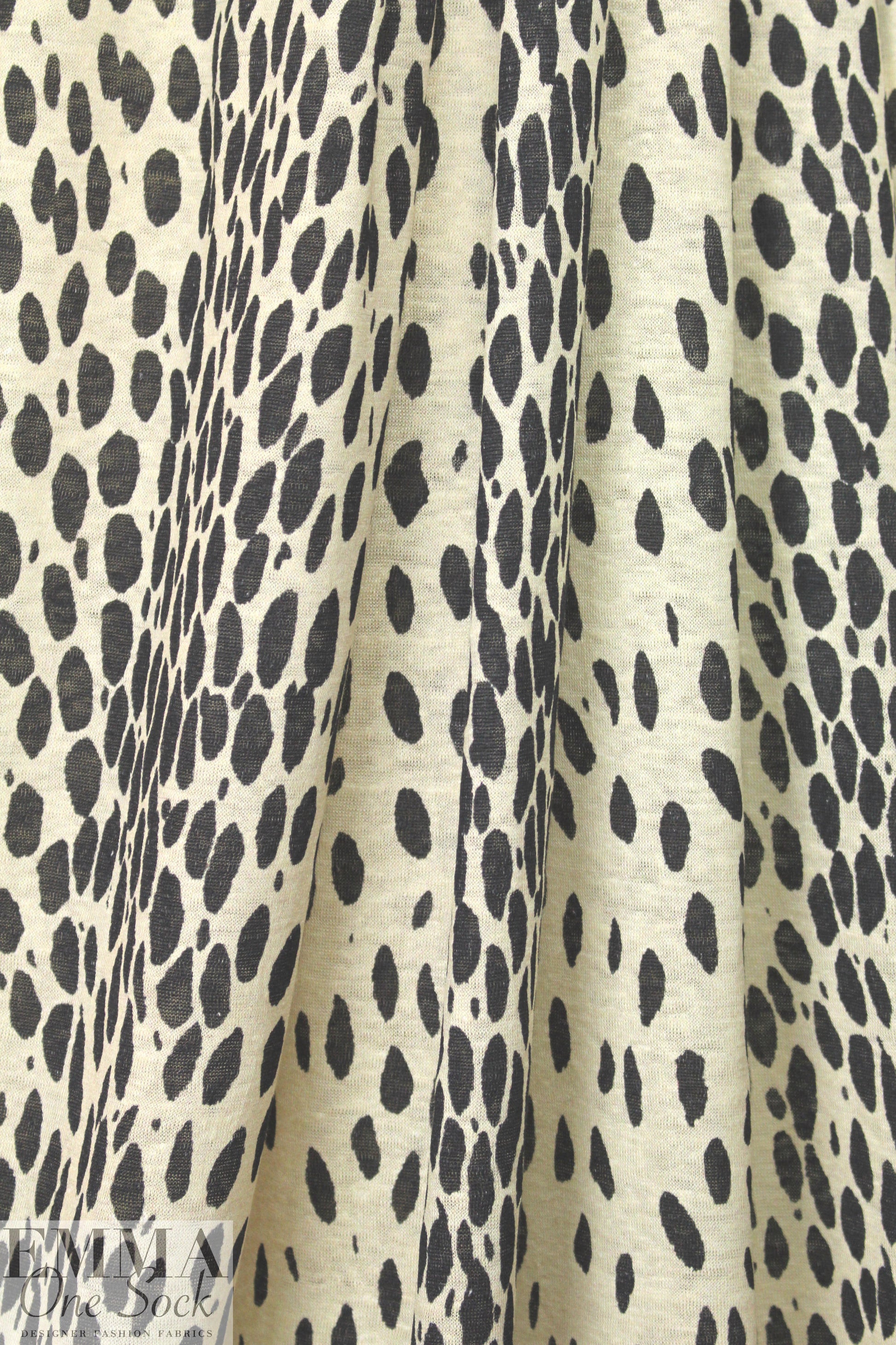 NY designer lightweight linen knit - animal dot .75 yds