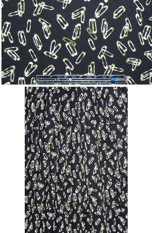 famous designer safety pin graphic matte jersey .875 yds
