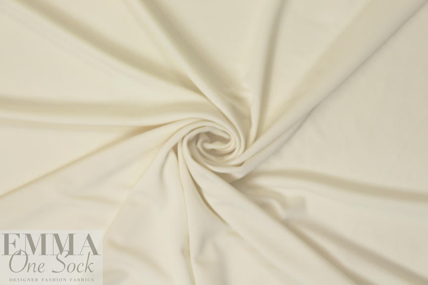 NY designer top quality rayon matte jersey - ivory .66 yds
