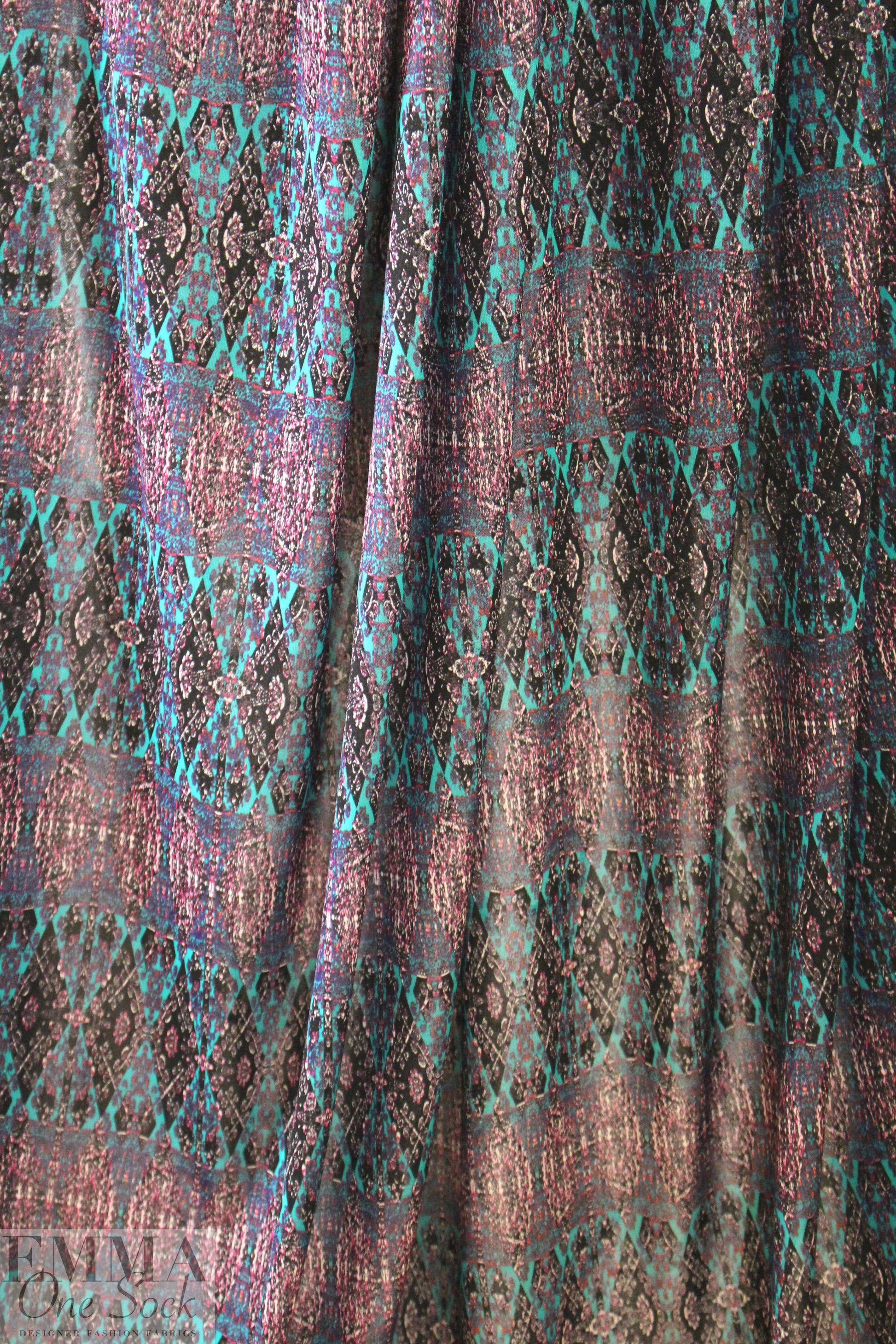 famous designer intricate stripe matte jersey - turq .75 yds