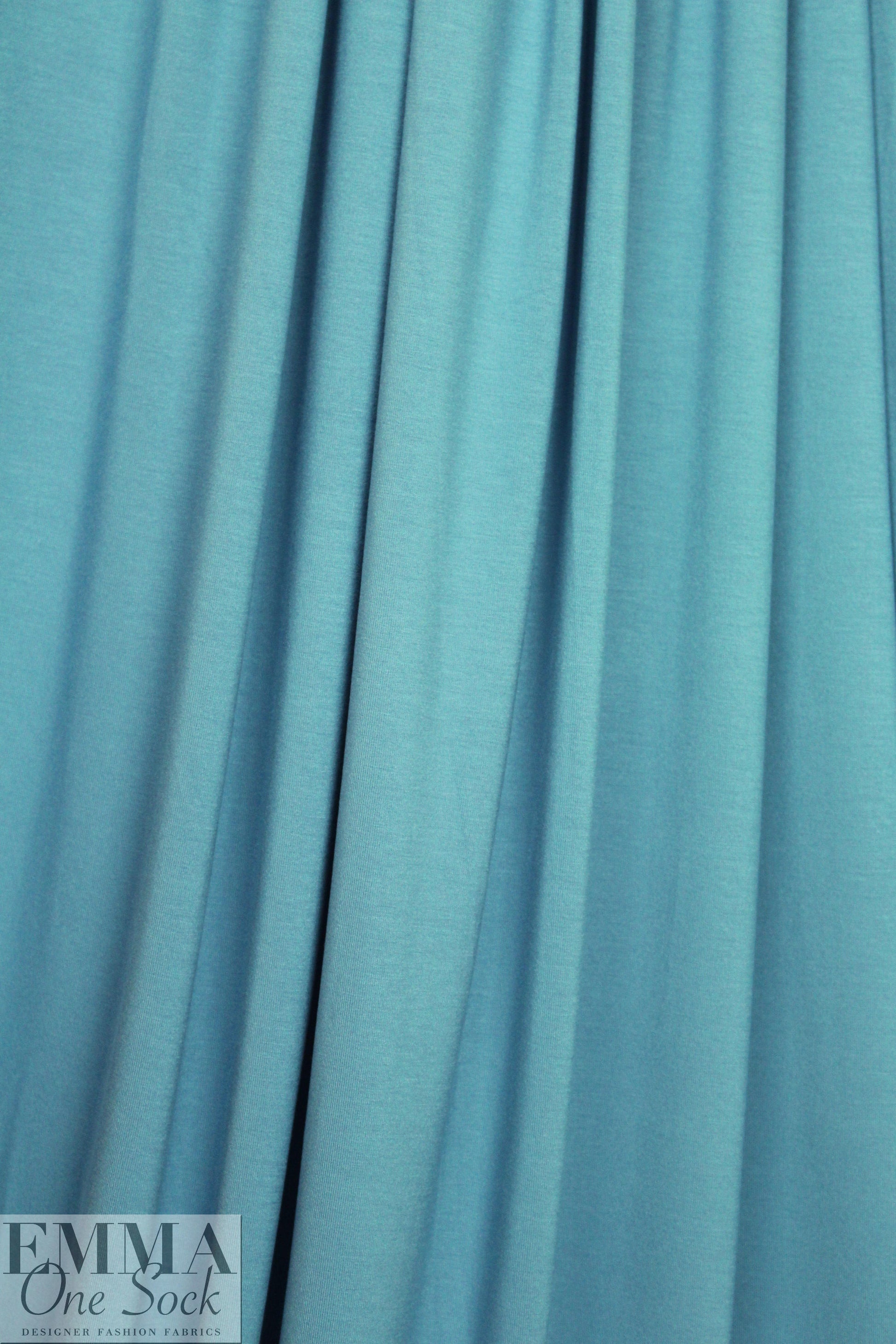 dusty blue lightweight rayon jersey 4-way .75 yds