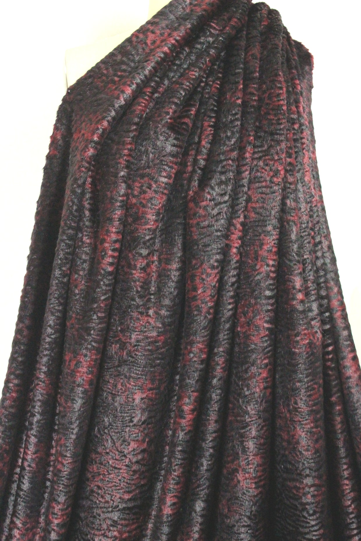 Tah@ri printed faux Persian lamb - burgundy animal 1.375 yds