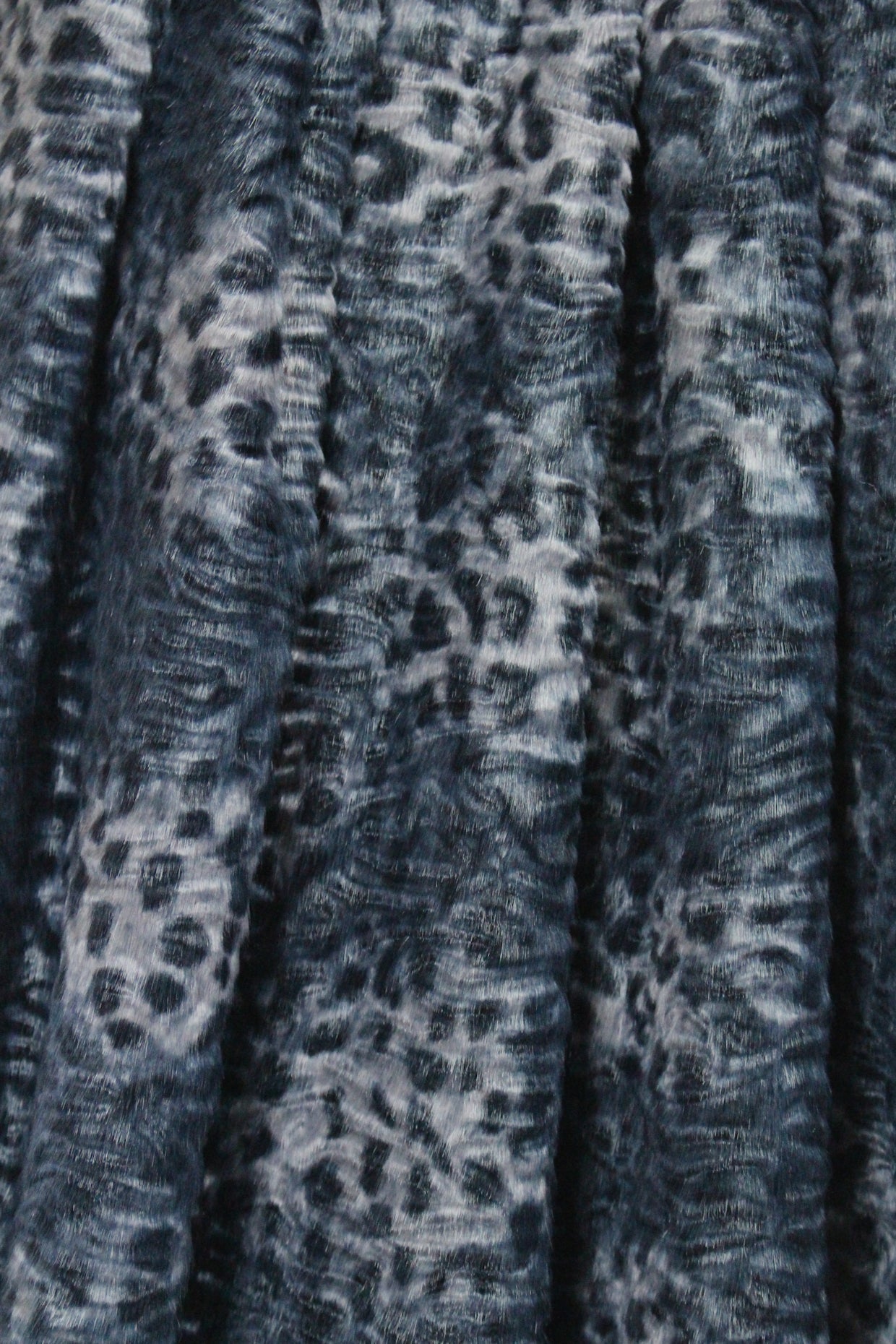 Tah@ri printed faux Persian lamb - navy animal 1.875 yds