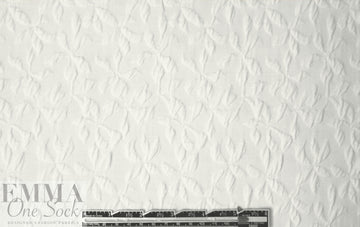textured pinwheel pique novelty knit - white 1.875 yd