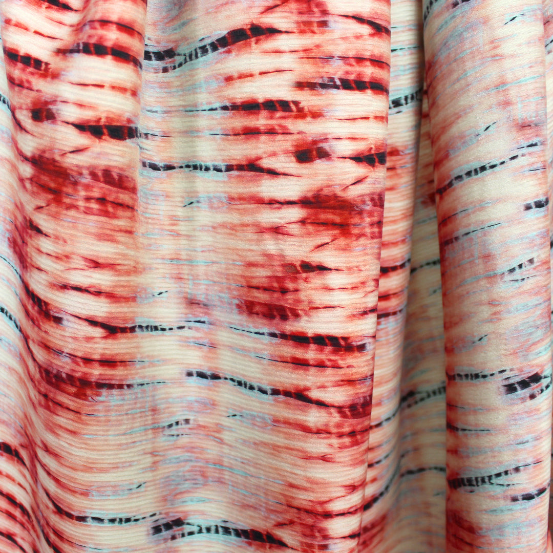 tie dye viscose accordion plisse' woven- pomegranate/sky 1.625 yd