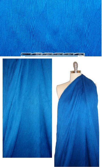 CA designer plisse' look matelasse'- palace blue .875 yds