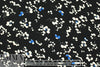 Pol0 drapey woven- flowers on black 1 yard