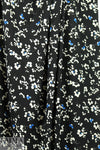 Pol0 drapey woven- flowers on black 1.25 yds