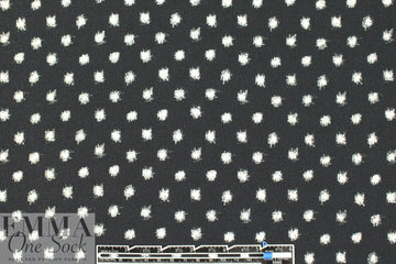 Rebecca Tayl0r specks on black stretch woven .875 yds
