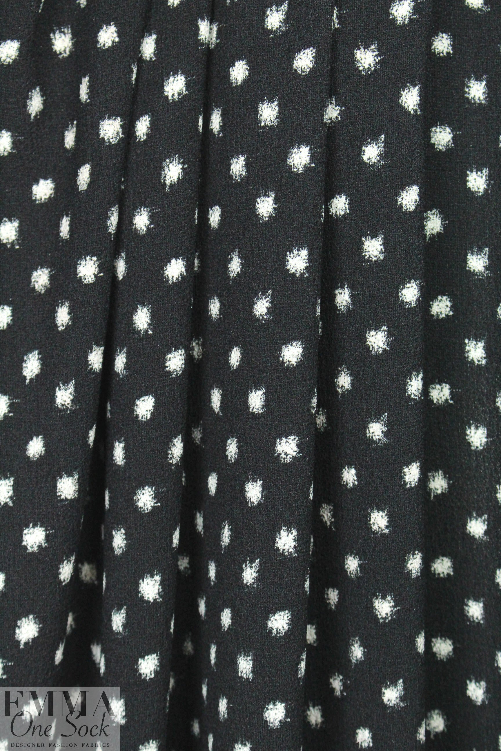 Rebecca Tayl0r specks on black stretch woven .875 yds