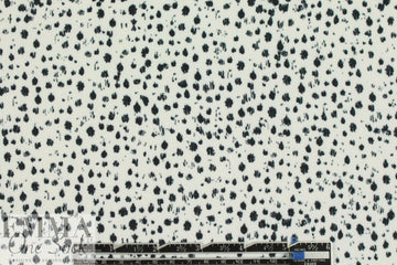 Rebecca Tayl0r speckles on white stretch crepe woven 1 yard