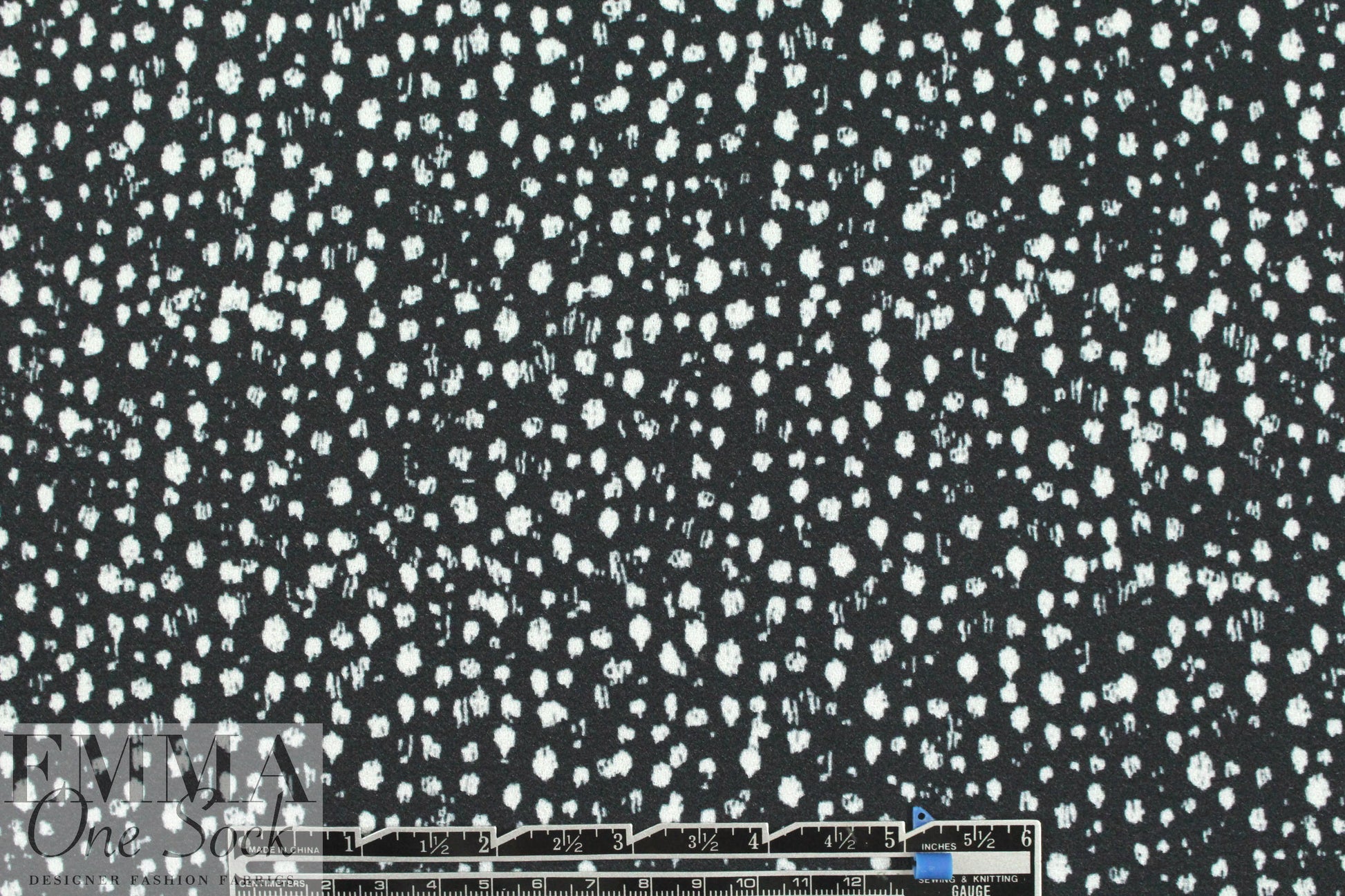 Rebecca Tayl0r speckles on black stretch crepe woven 1.875 yd