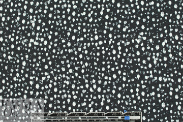 Rebecca Tayl0r speckles on black stretch crepe woven 1.875 yd