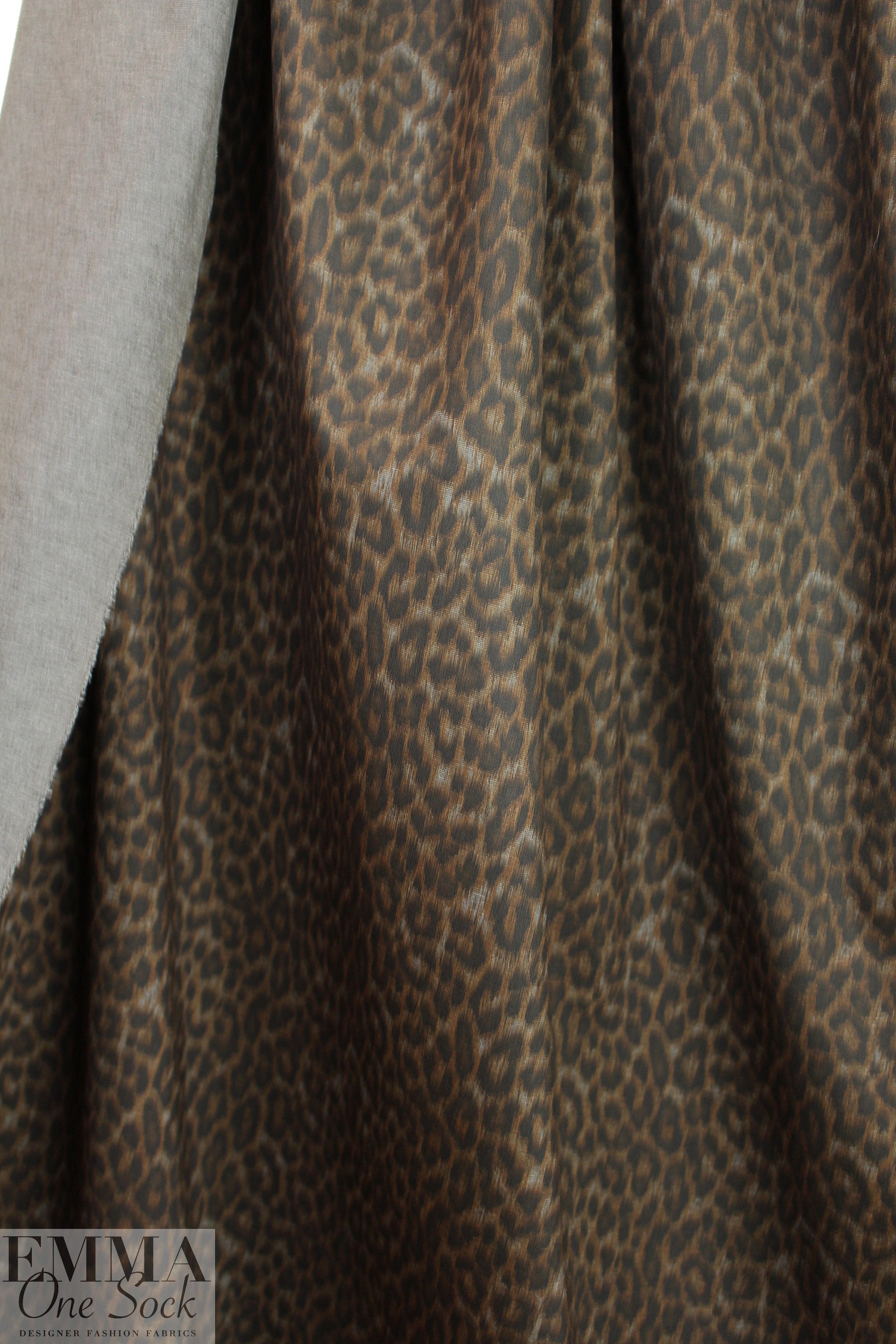 leopard print ponte - nutmeg/charcoal .875 yds