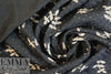 French printed 3-ply quilted-look knit - black leaf/dot