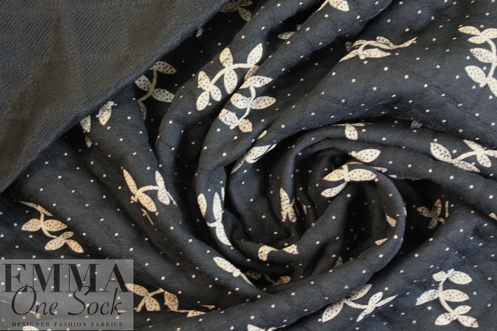 French printed 3-ply quilted-look knit - black leaf/dot 1.875 yds