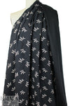 French printed 3-ply quilted-look knit - black leaf/dot 1.875 yds