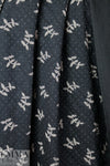 French printed 3-ply quilted-look knit - black leaf/dot 1.75 yd