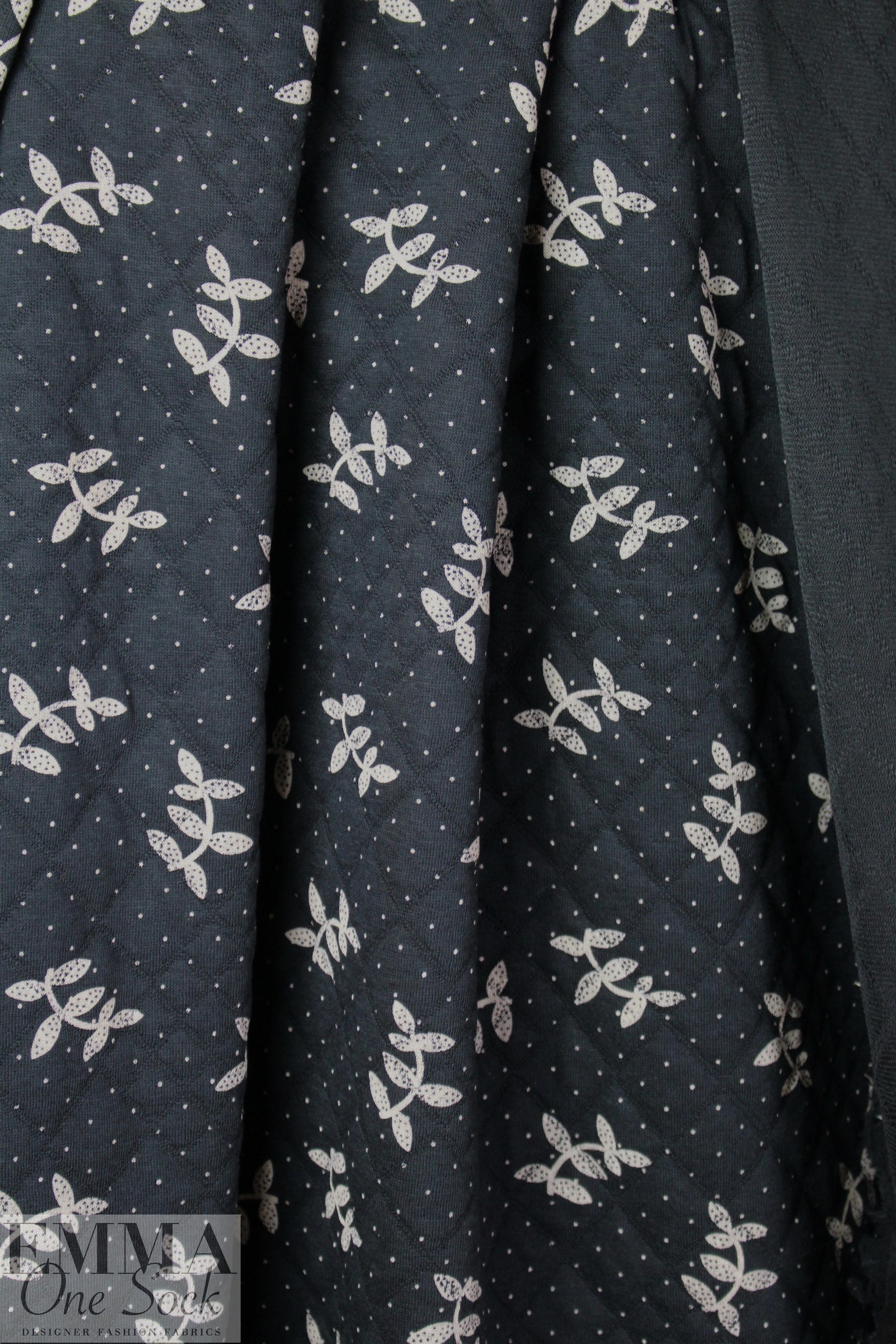 French printed 3-ply quilted-look knit - black leaf/dot 1.75 yd
