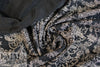 French printed 3-ply quilted-look knit - black deco flor 1 yard